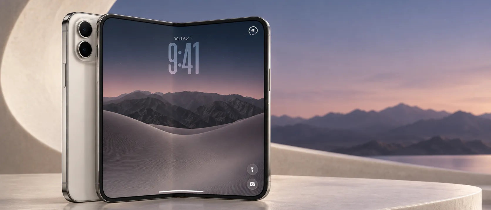 An iPhone Duo in titanium, half open on a curved stone terrace at dusk